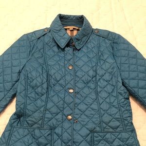 Burberry Female puffer jacket.